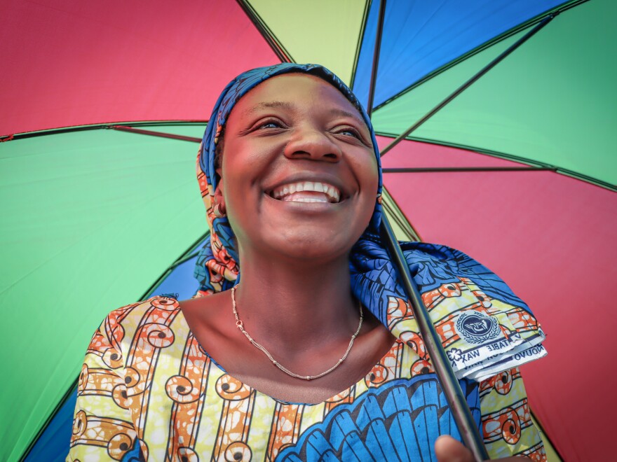 Néema Byanyira, 25, a mom of three, is rarely without her umbrella when she's on the move. She brings it to market, to church and to visit her sister.