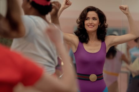 Rose Byrne, in purple on right, plays Sheila in the 1980s-set Physical.