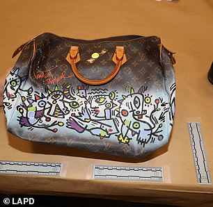 He had organized the luxury handbags by their designers, which included Balenciaga, Chanel and Louis Vuitton