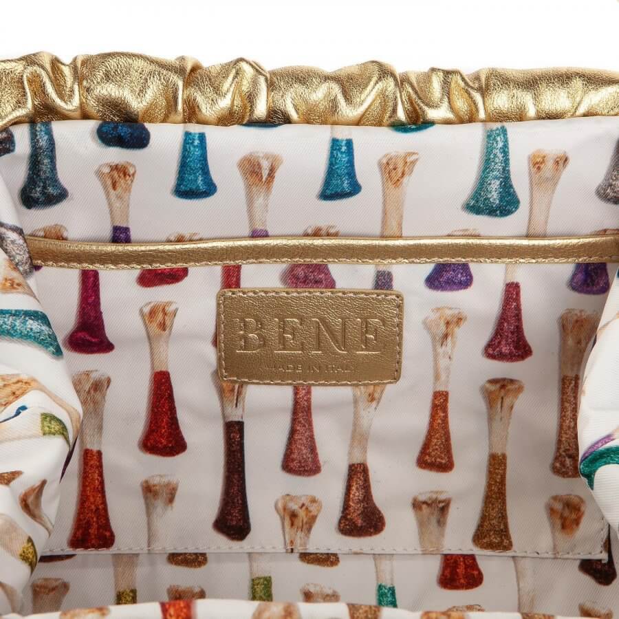 Lining of a BENE handbag with glitter chicken bone design