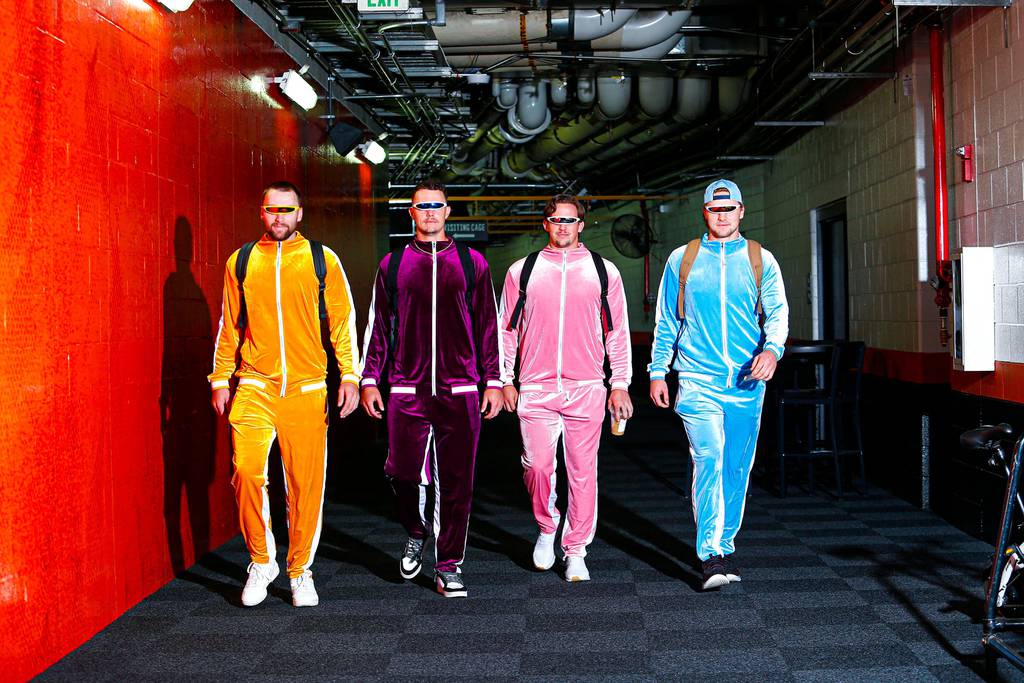 From left, Colton Cowser, Ryan Mountcastle, Adley Rutschman and Gunnar Henderson wore matching jumpsuits and sunglasses to Camden Yards on Friday before the Orioles' game with the New York Mets.