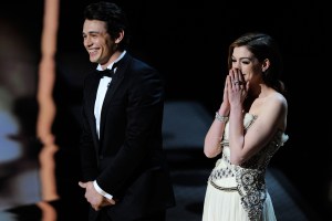 Presenters James Franco and Anne Hathaway speak onstage during the 83rd Annual Academy Awards held at the Kodak Theatre on February 27, 2011 in Hollywood, California.