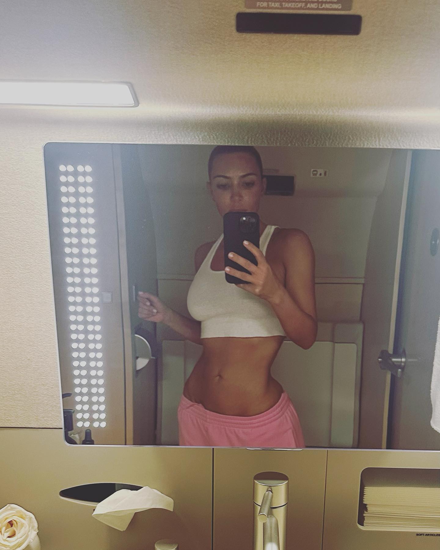 Fans accused Kim of Photoshopping her waist in a new mirror selfie