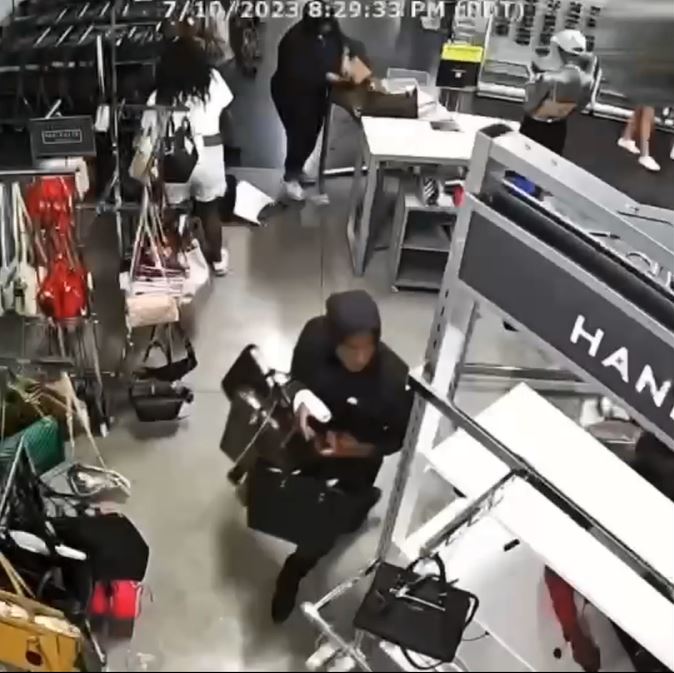 Security video captured a mob of thieves ransacking a Nordstrom Rack in Riverside and escaping with thousands of dollars worth of designer handbags. (Riverside Police Department)