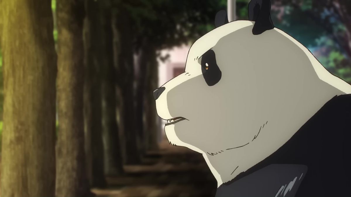 An image showing Panda in the Jujutsu Kaisen season 2 trailer. He’s looking majestic in the warm yellow of a city light.