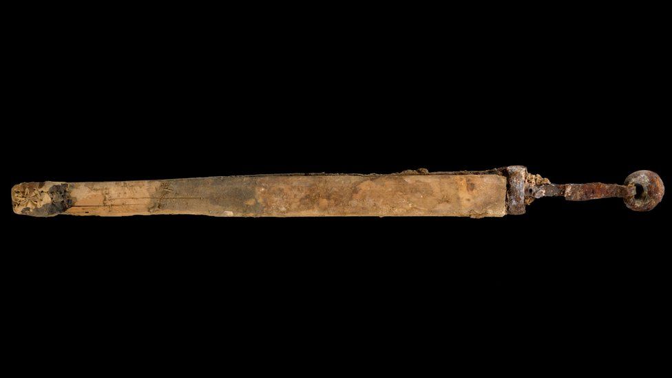The sword stashed away in a hidden spot in the cave. Photography Dafna Gazit Israel Antiquities Authority