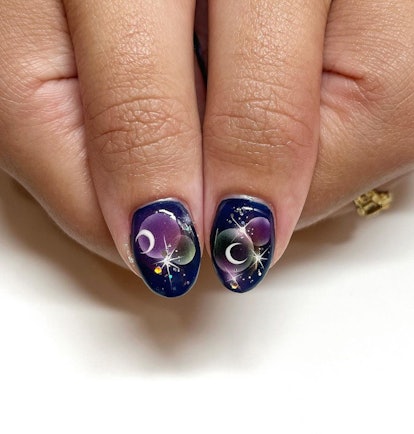 Dark night sky nails.