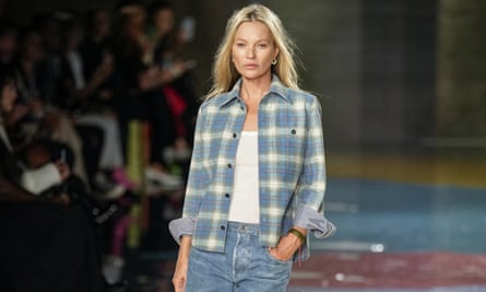 Kate Moss wears a creation as part of the Bottega Veneta women’s Spring Summer 2023 collection presented in Milan, Italy, Saturday, Sept. 24, 2022