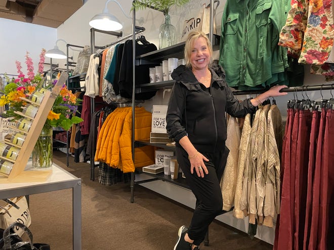 Women's clothing boutique owner Karen Backus has opened the doors to The Coral Sash Boutique in Brighton earlier than expected.