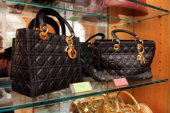 Spot the difference ... Genuine and counterfeit Dior bags displayed at the Counterfeit Museum in Paris.