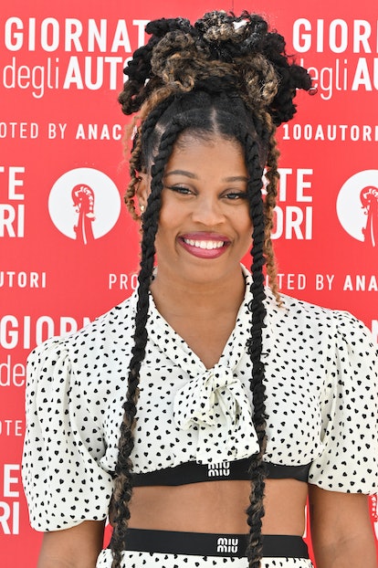 Dominique Fishback long half-up twists at Venice Film Fest 2023