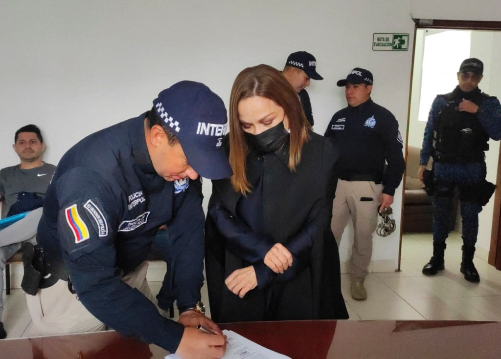 Gonzalez had her fingerprints taken before boarding the extradition flight with Interpol.