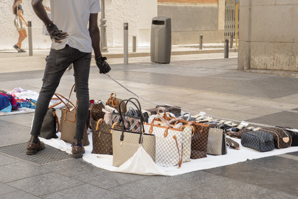 The counterfeit bag trade is shifting from street vendors to online.