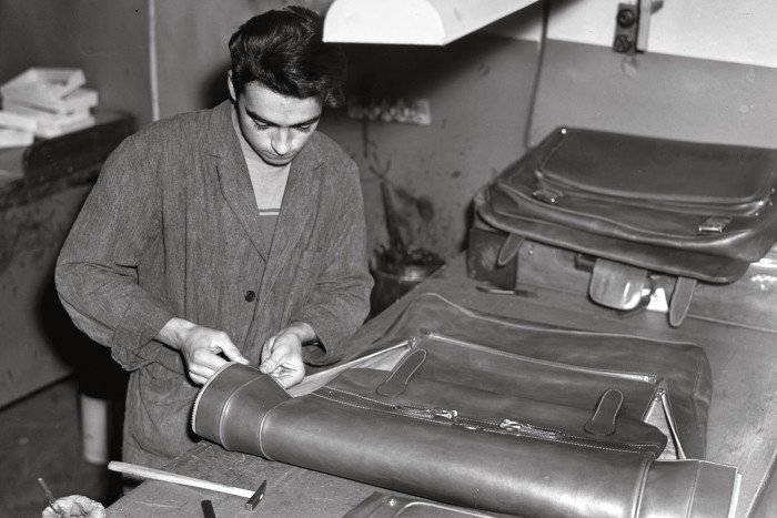 An artisan in the Gucci leather workshop, 1950