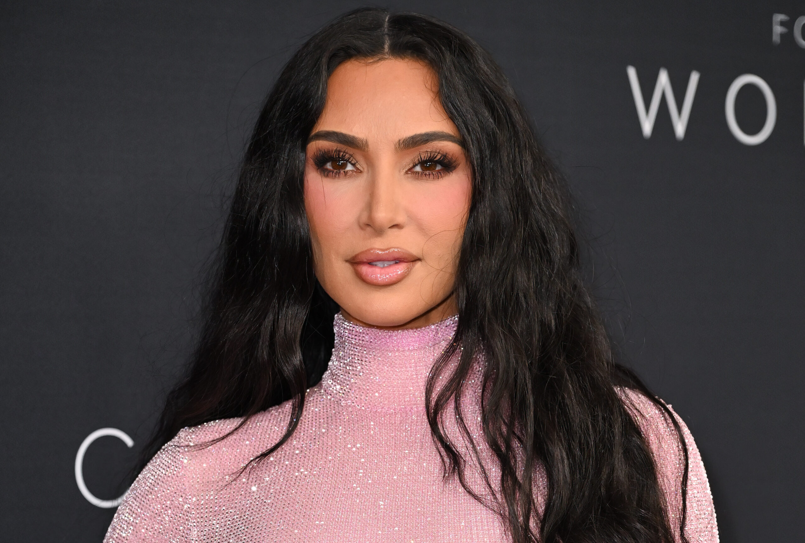 Some critics called out The Kardashians star for her bigger chin and lips in the new photos taken at the gala
