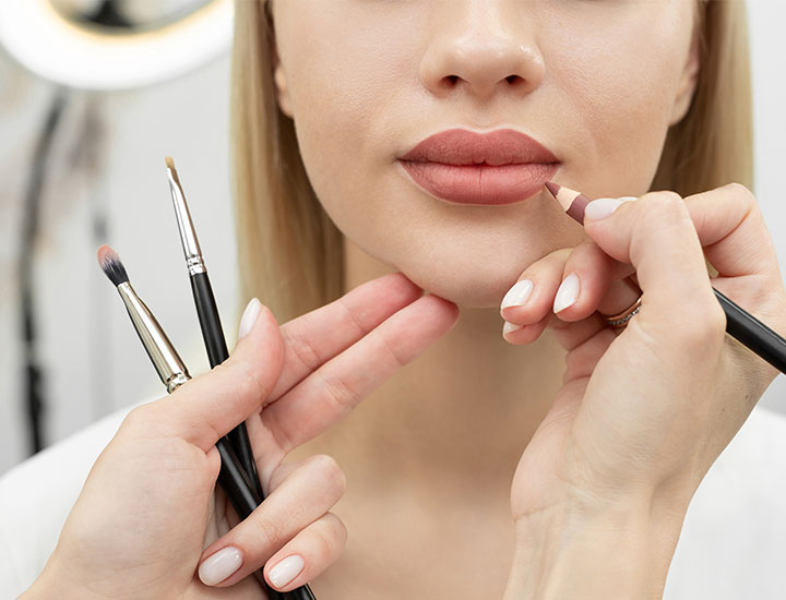 makeup-artists-applying-lip-liner