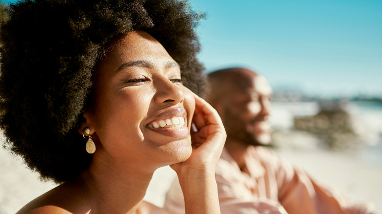 Woman with clear skin in sun