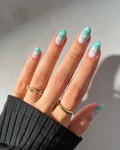 Cloud-filled sky blue nails that are inspired by 1989 (Taylor's Version).