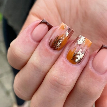 Gold leaf nails.