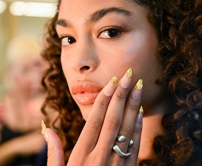 3D gold French tip nails at Prabal Gurung Spring/Summer 2024 at New York Fashion Week in September 2...