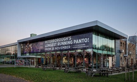 Modernist building with banner saying ‘Peterborough’s longest running panto’