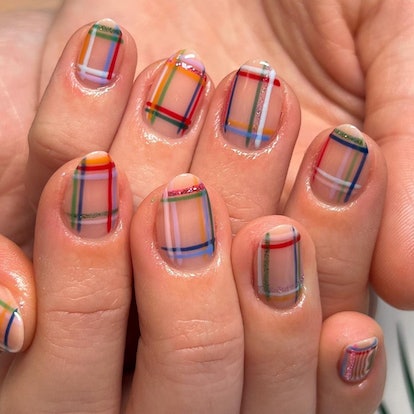 Short rainbow plaid nails.