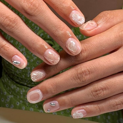 If you need manicure inspo, here is a simple neutral nail design for short nails that's on-trend for...