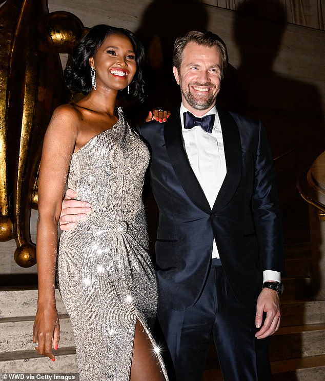 Dapper: Oliver looked handsome in a white shirt, black tuxedo, and matching bowtie with a sheen finish