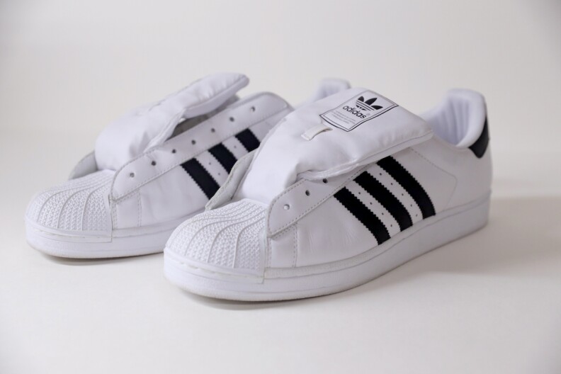 Run-D.M.C.'s Adidas: White, no laces and black stripes.