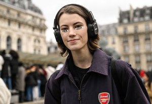 PARIS, FRANCE - MARCH 06: Model Dana Smith is seen wearing a blue vintage jacket and Marshall headphones with silver eye jewelry outside the Louis Vuitton show during Paris Fashion Week F/W 2023 on March 06, 2023 in Paris, France. (Photo by Daniel Zuchnik/Getty Images)