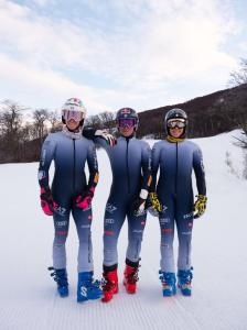 Italian winter sports athletes donning the new EA7 ski suit for the 2023/2024 season.