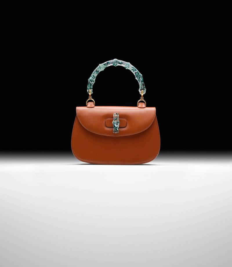 This Gucci Bamboo bag has been reimagined with a hand painted Murano glass handle. Photo: Christie's