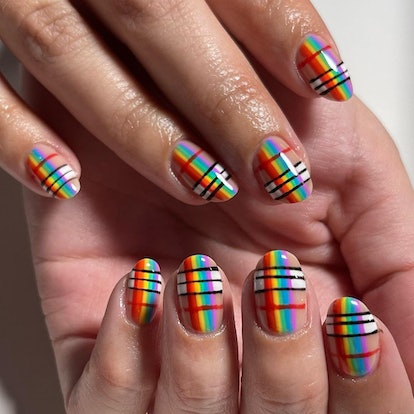 Short, rainbow plaid nails.