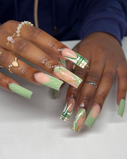 Green sweater nails with green and gold plaid French tips.