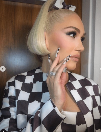 Gwen Stefani's checkered nail art design for scorpio season 2023 manicure ideas.