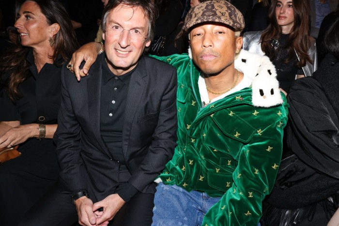 Louis Vuitton chief executive Pietro Beccari, left, and Pharrell Williams