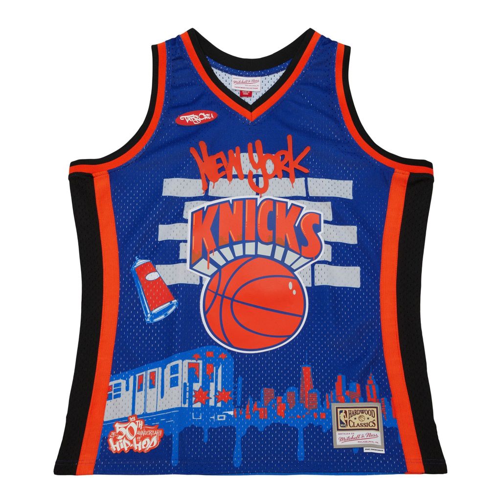 blue, black and orange jersey with graffiti knicks design