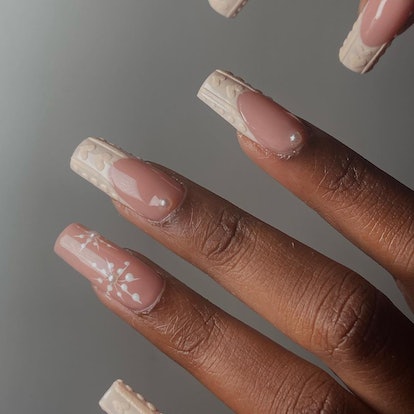 Beige cable-knit sweater nails that match the cabincore aesthetic.