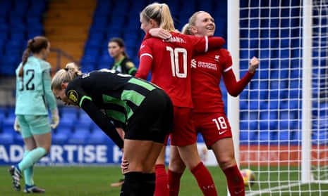 Ceri Holland of Liverpool celebrates scoring Liverpool's third goal.