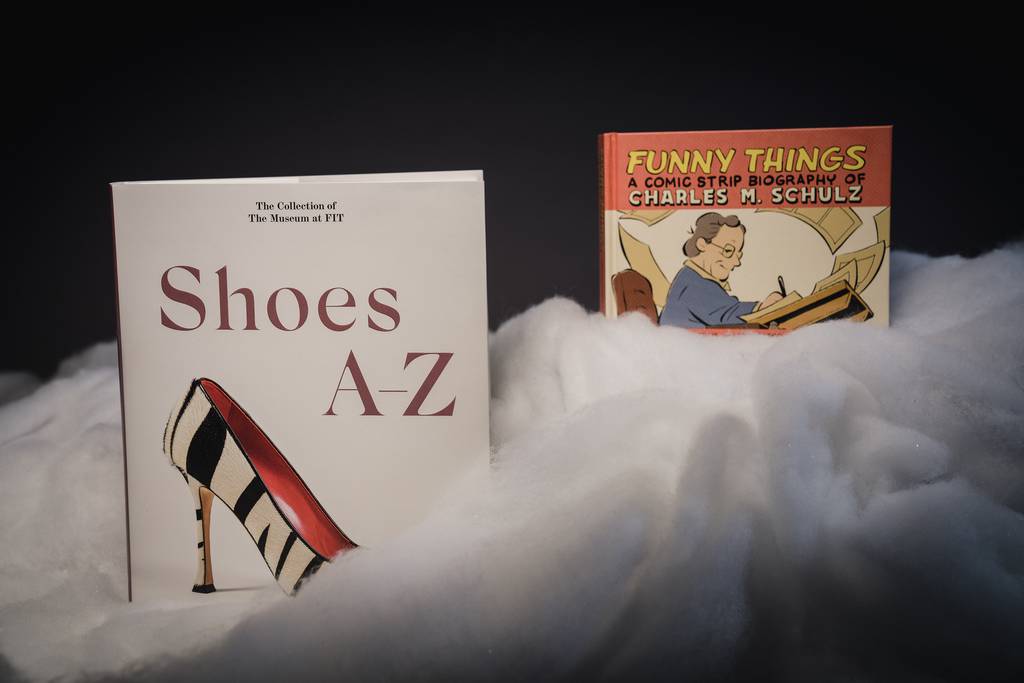 For fans of the prosaic: “Shoes A-Z” is Taschen’s gargantuan coffee table history of high-end footwear. “Funny Things” is a clever biography of cartoonist Charles M. Schulz that channels the heart of daily “Peanuts” strips.