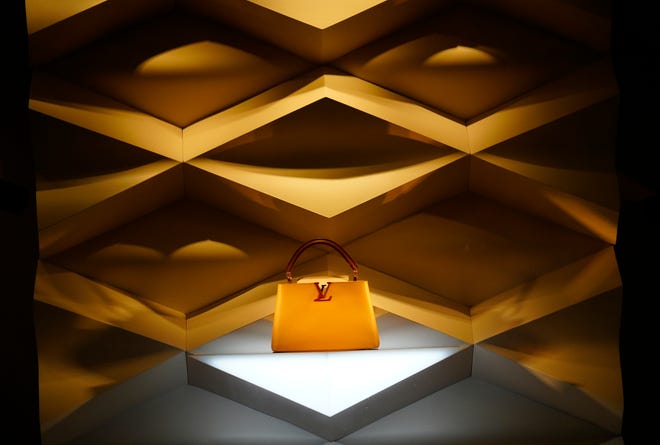 A purses on display at the Louis Vuitton store in Kenwood Towne Centre Wednesday, Oct. 26, 2023. They’ve been open since November of 2018. The French luxury store is known for its monogrammed handbags and luggage.