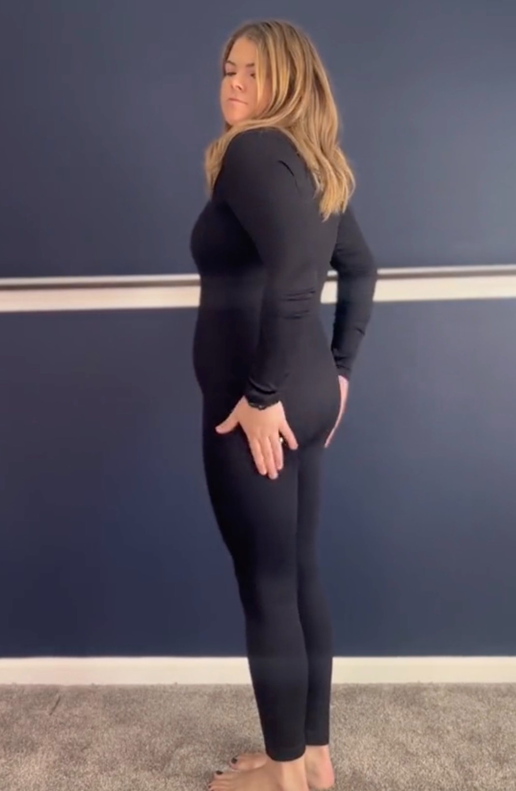 Normally, she hated tight clothes around her belly