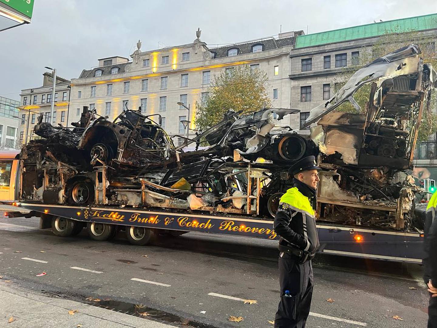 Burned out vehicles and a Luas in Dublin city centre on Friday morning after rioting in the capital on Thursday night. Photograph: Conor Pope