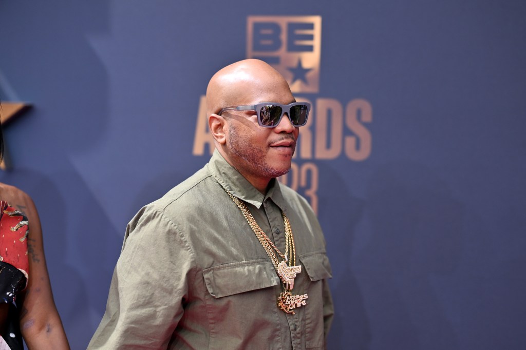 Styles P wearing sunglasses