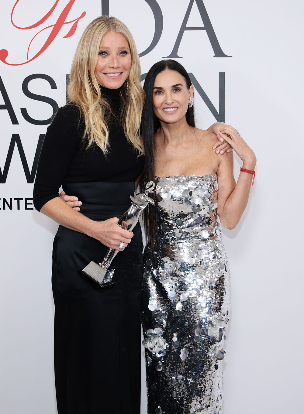 Gwyneth Paltrow and Demi Moore pose with an award at the 2023 CFDA Fashion Awards at American Museum of Natural History on November 06, 2023 in New York City.