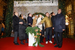 PARIS, FRANCE - NOVEMBER 16: (R-L) A Guest,a Guest,Philippe Lellouche,Elodie Fontan,Christina Milian (center) and members of the Faubourg Saint Honore Committee attend the Christmas Lights Launch at Faubourg Saint-Honore on November 16, 2023 in Paris, France. (Photo by Pierre Suu/Getty Images)