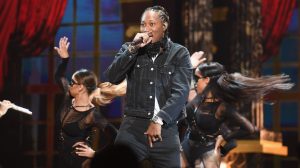 Future performing at the BET Awards, wearing a Black denim jacket and white shirt.