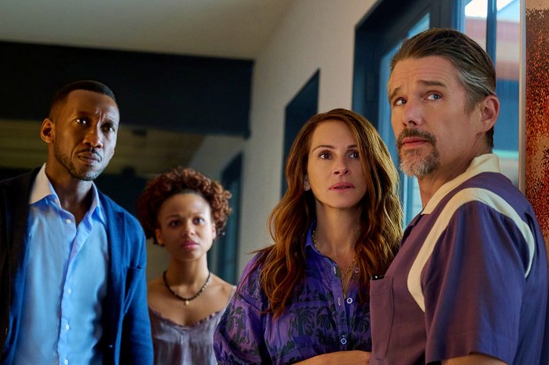 Mahershela Ali, left, Myha'la, Julia Roberts and Ethan Hawk appear in a scene from the upcoming drama 