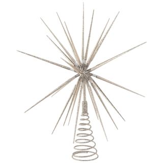 A silver spiky Christmas tree star topper