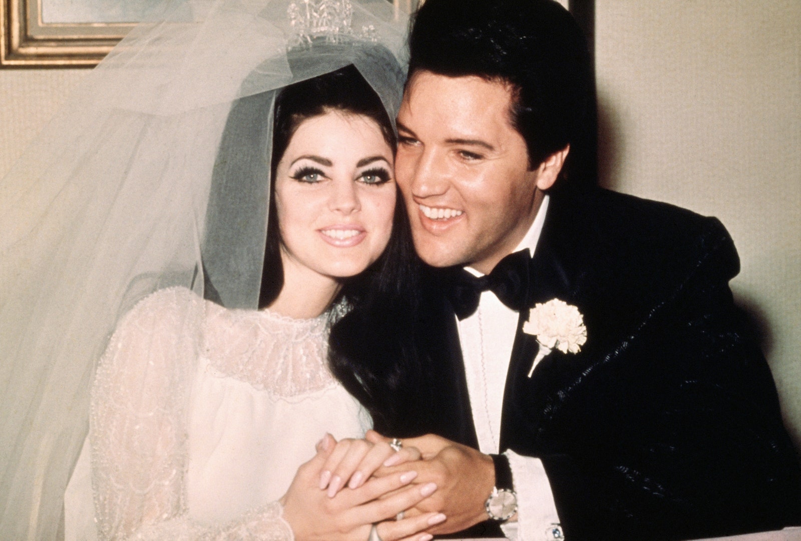 priscilla and elvis presley sit cheek to cheek after getting married in las vegas